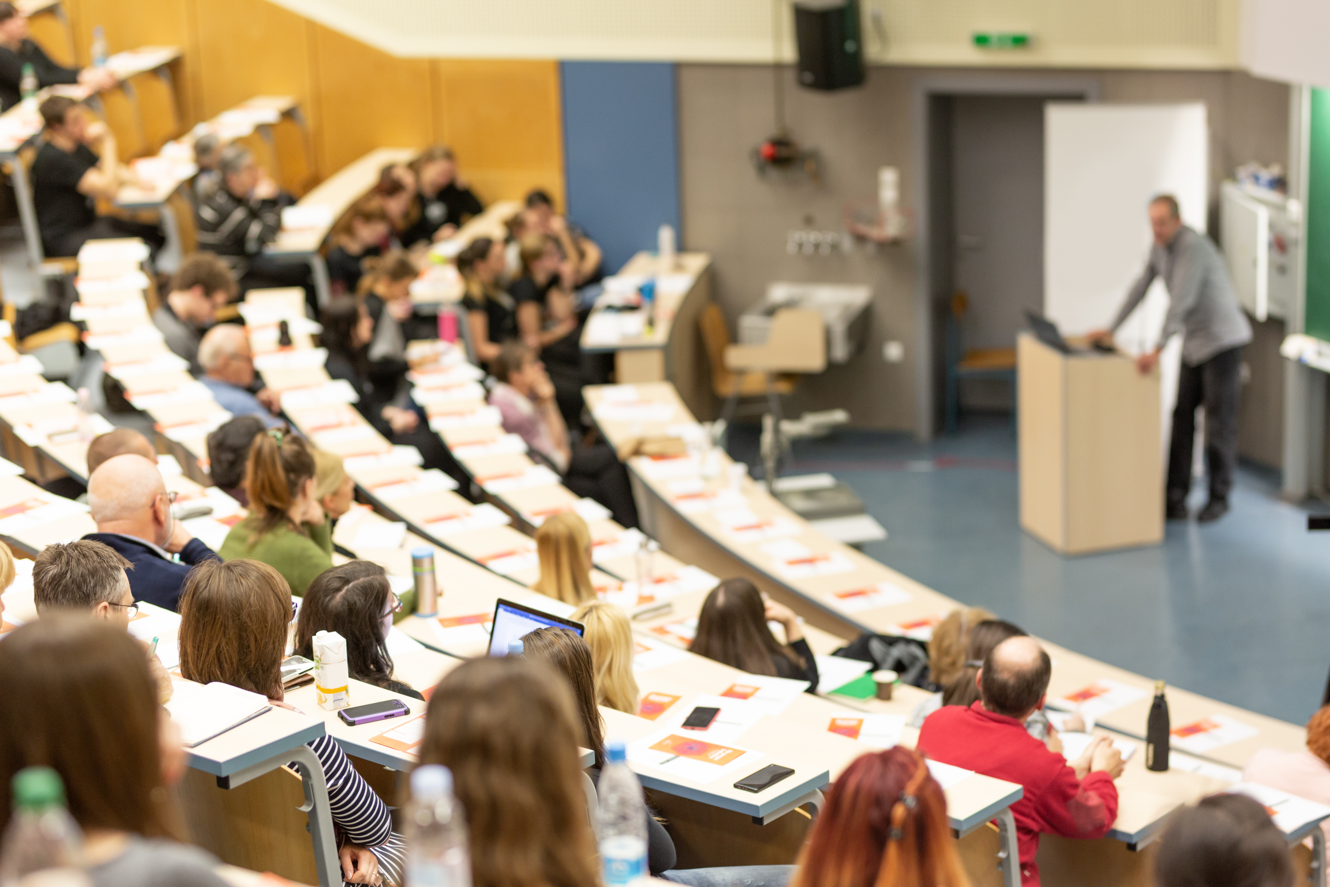 A teacher teaching a full class