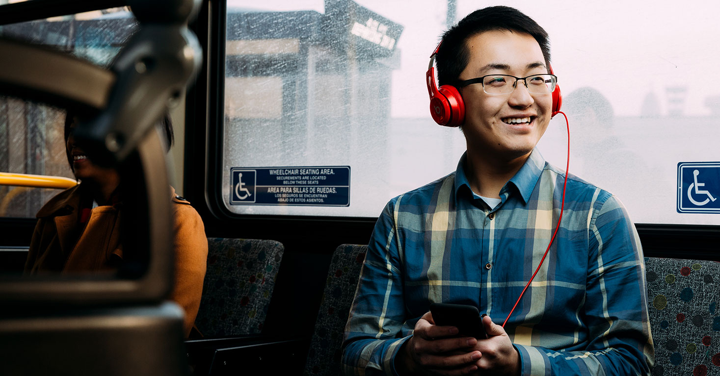 Man sitting on a bus