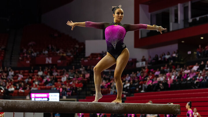 Csenge competing on the beam
