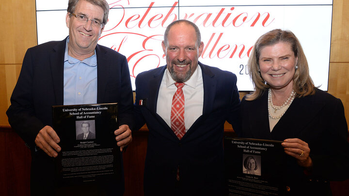 From left to right: Ralph Castner, '85, Dr. Aaron Crabtree and Linda Burt, '73, celebrate induction into the School of Accountancy Hall of Fame.