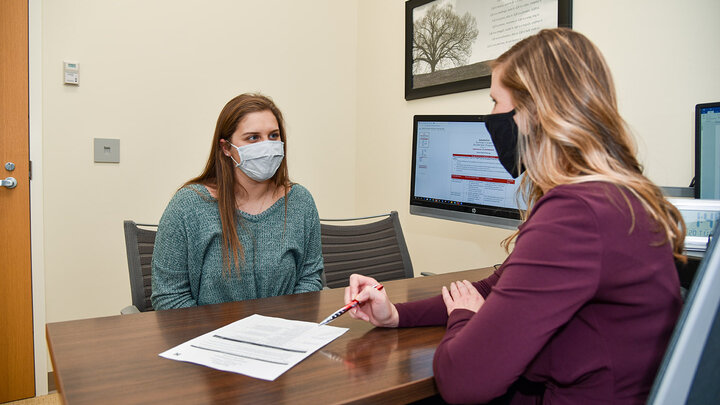 Grace Novak, senior marketing major, meets with Lauren Stehlik, assistant director of the Business Career Center