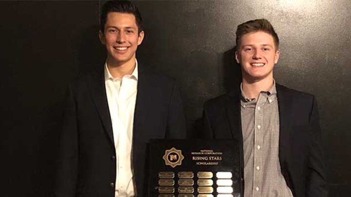 Conrad Shiu (left) and Nathan Netz (right) had their names added to the Rising Stars plaque, on display in the Center for Sales Excellence.