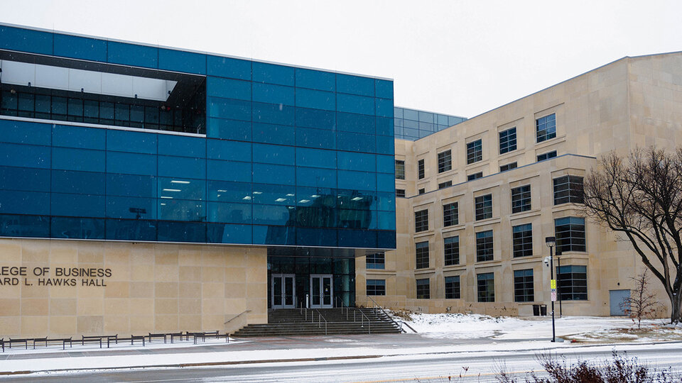 Hawks Hall while snowing