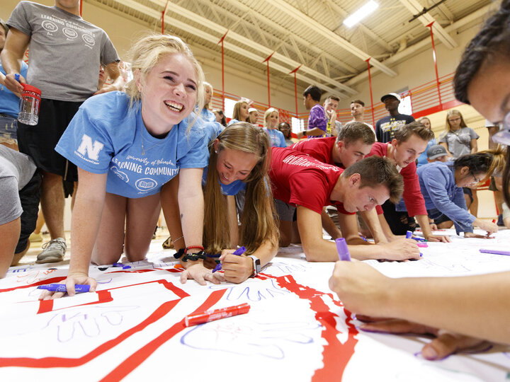 Students at a business learning community event
