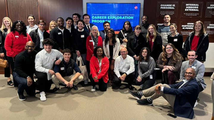 Business students standing for picture at the Minneapolis Foundation
