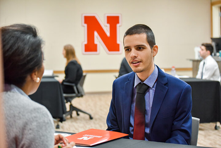 As part of the Professional Enhancement Program, business students take four one-credit-hour courses designed to enrich career and professional skills, like in BSAD 333, where students practice interviewing with real-world professionals. *photo taken prior to pandemic.