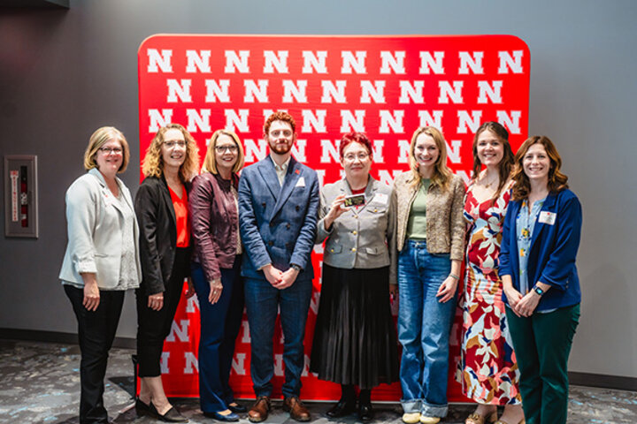 The university's Family and Friends Recognition Awards recognized eight business faculty and staff members who made a significant difference for students this year.