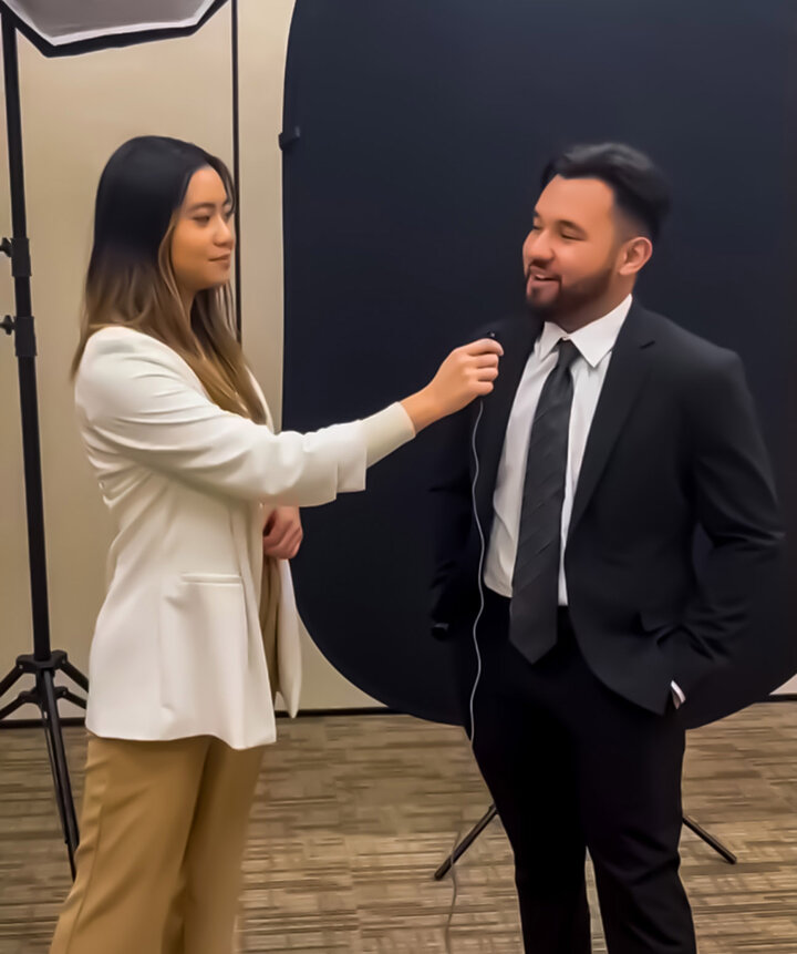Jermaine interviewing a student