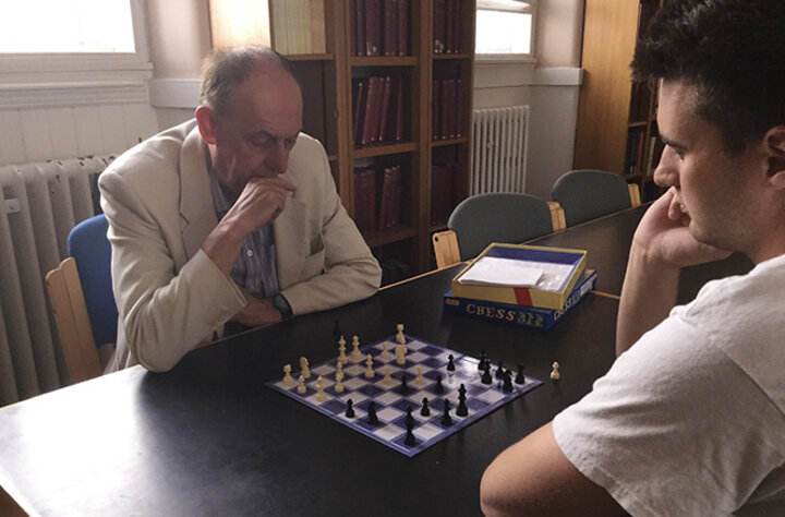 Dr. Martin Holmes plays in the annual chess tournament.