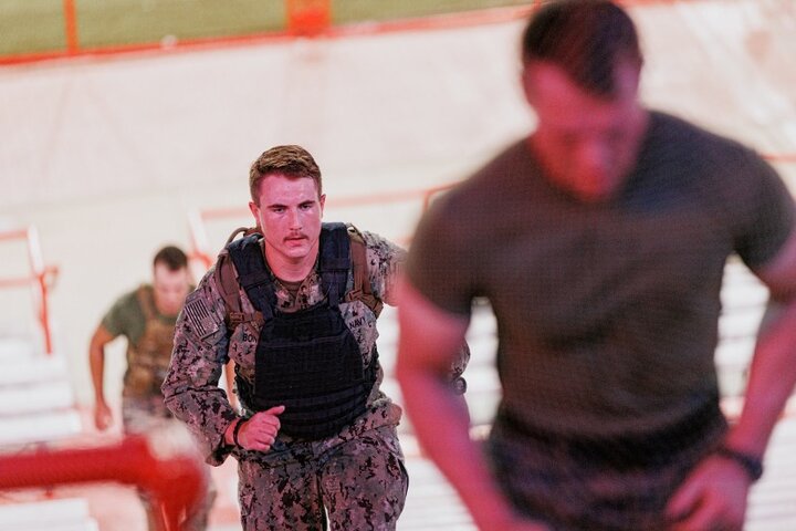 Midshipman Cohan Bonow runs the east Memorial Stadium steps during a memorial stair climb on September 11, 2022.