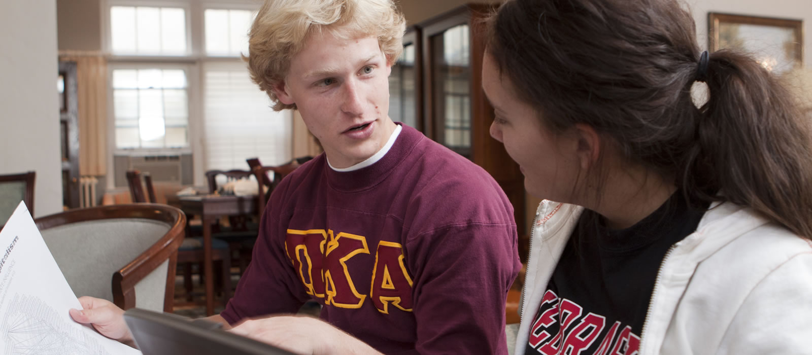 Students discussing research