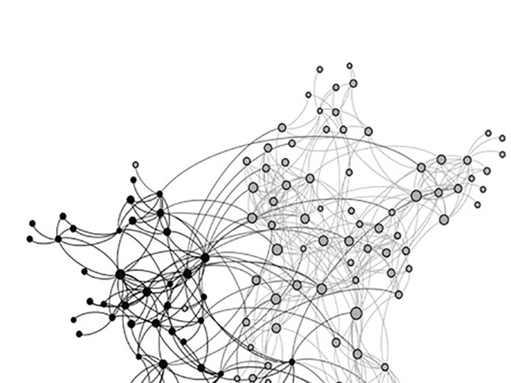 A black and white network showing advice-seeking relationships among teachers. The network is mostly connected, with a few isolates in the upper left corner.