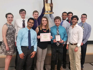 AIChE with their first place trophy