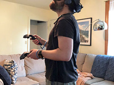 A person using Google Earth with the HTC-Vive