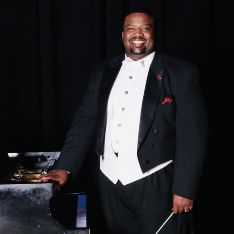 Carlos B. Brown in tuxedo.