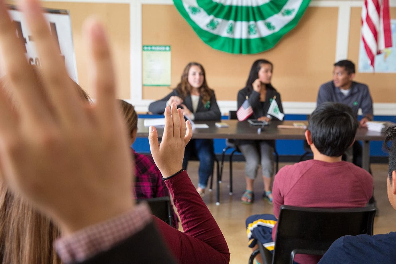 Youth participating a club meeting