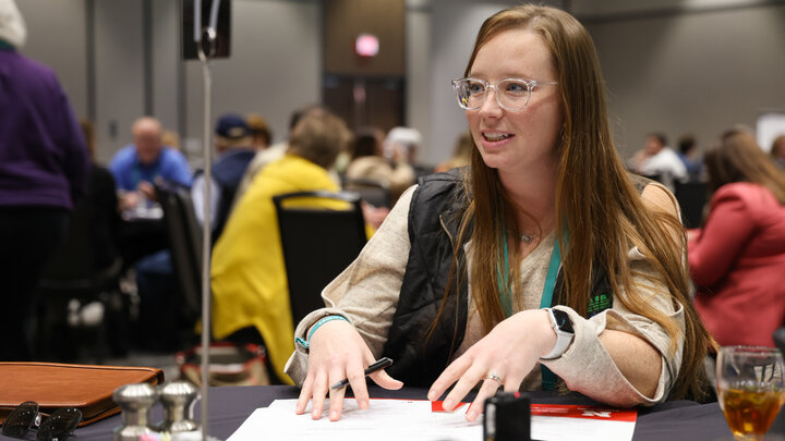 A woman participates in a table discussion during the Leadership Chautauqua event held in December in Kearney, Neb.” Photo by Russell Shaffer