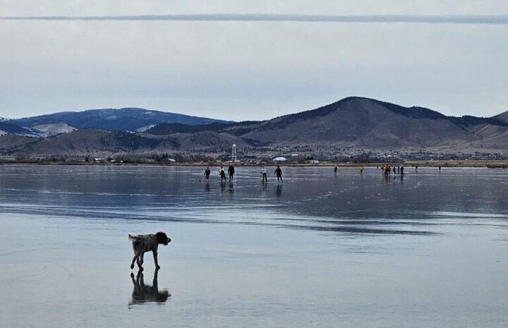 People skating on a frozen lake in Montana