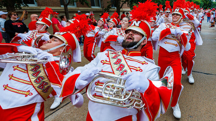 Marching band walking to stadium before football game