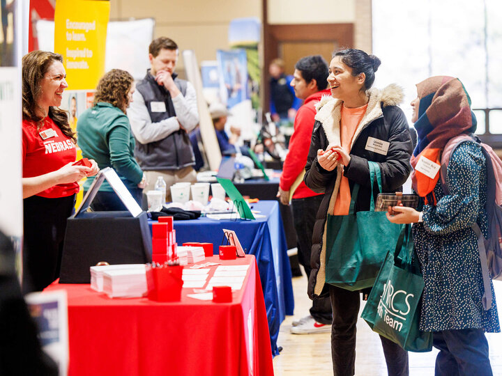 Students talk to prospective employers at East Campus career fair