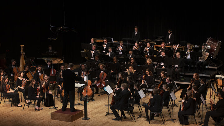File photo of UNL Symphony on stage at Kimball Recital Hall with Tyler White conducting.