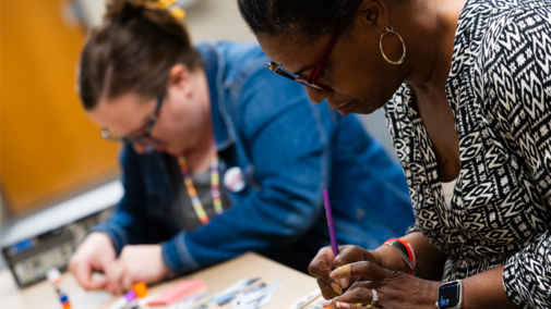Staff making mini journal pages