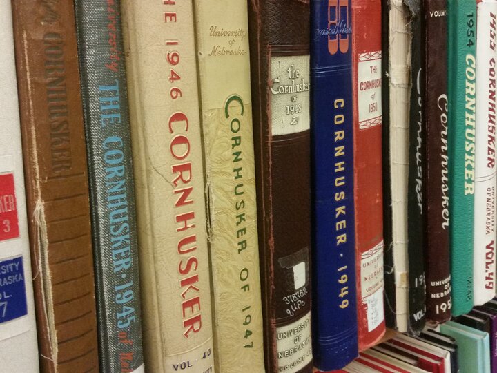 Cornhusker yearbooks on the shelf.