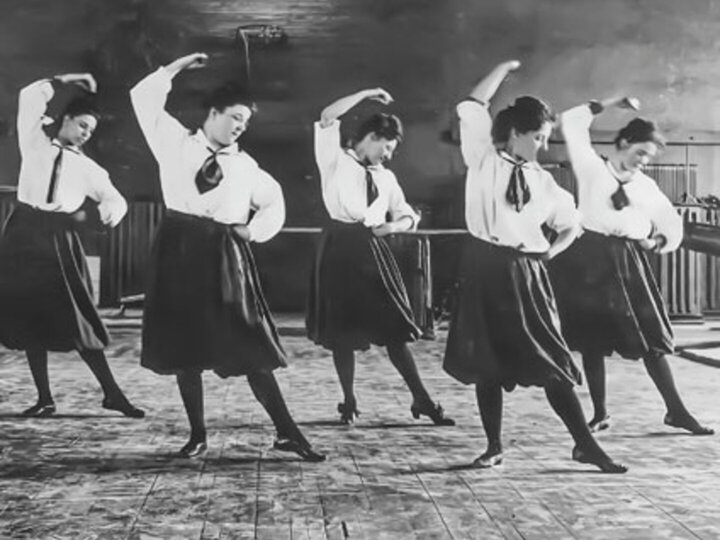 Photo from exhibit of women dancing